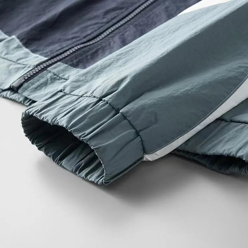 Oscar Relaxed Fit Windbreaker Jacket | Hooded Neck Color Block Hip-Length Windbreaker Jacket